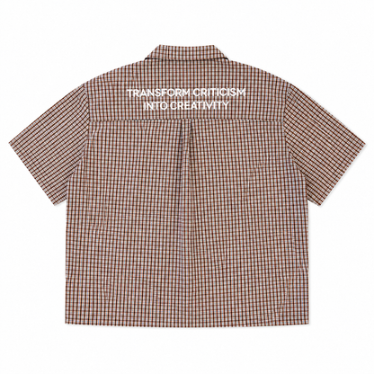 CHEMISE BOXY À CARREAUX À FERMOIRS MOUSQUETON