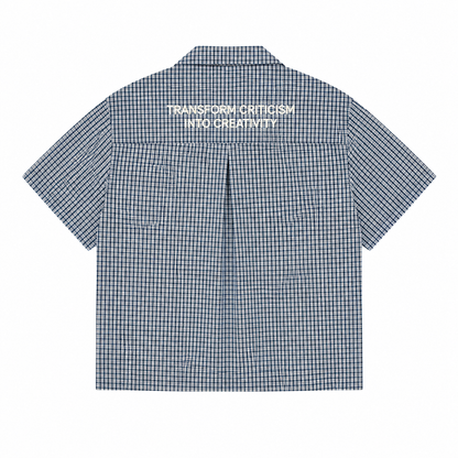 CHEMISE BOXY À CARREAUX À FERMOIRS MOUSQUETON