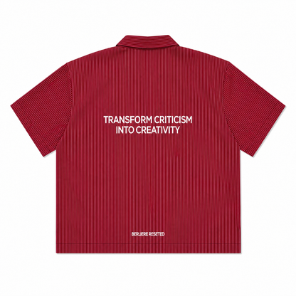 CHEMISE BOXY À RAYURE À FERMOIRS MOUSQUETON